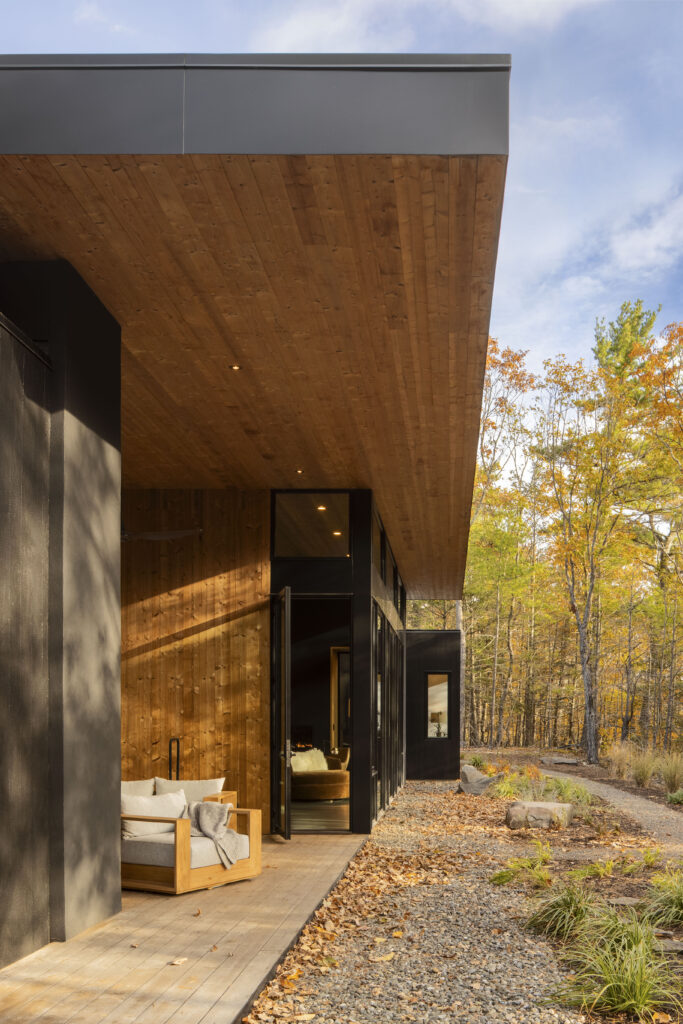 The roof overhang at Fermata includes warm wood soffits and a clean, precise, modern fascia detail.